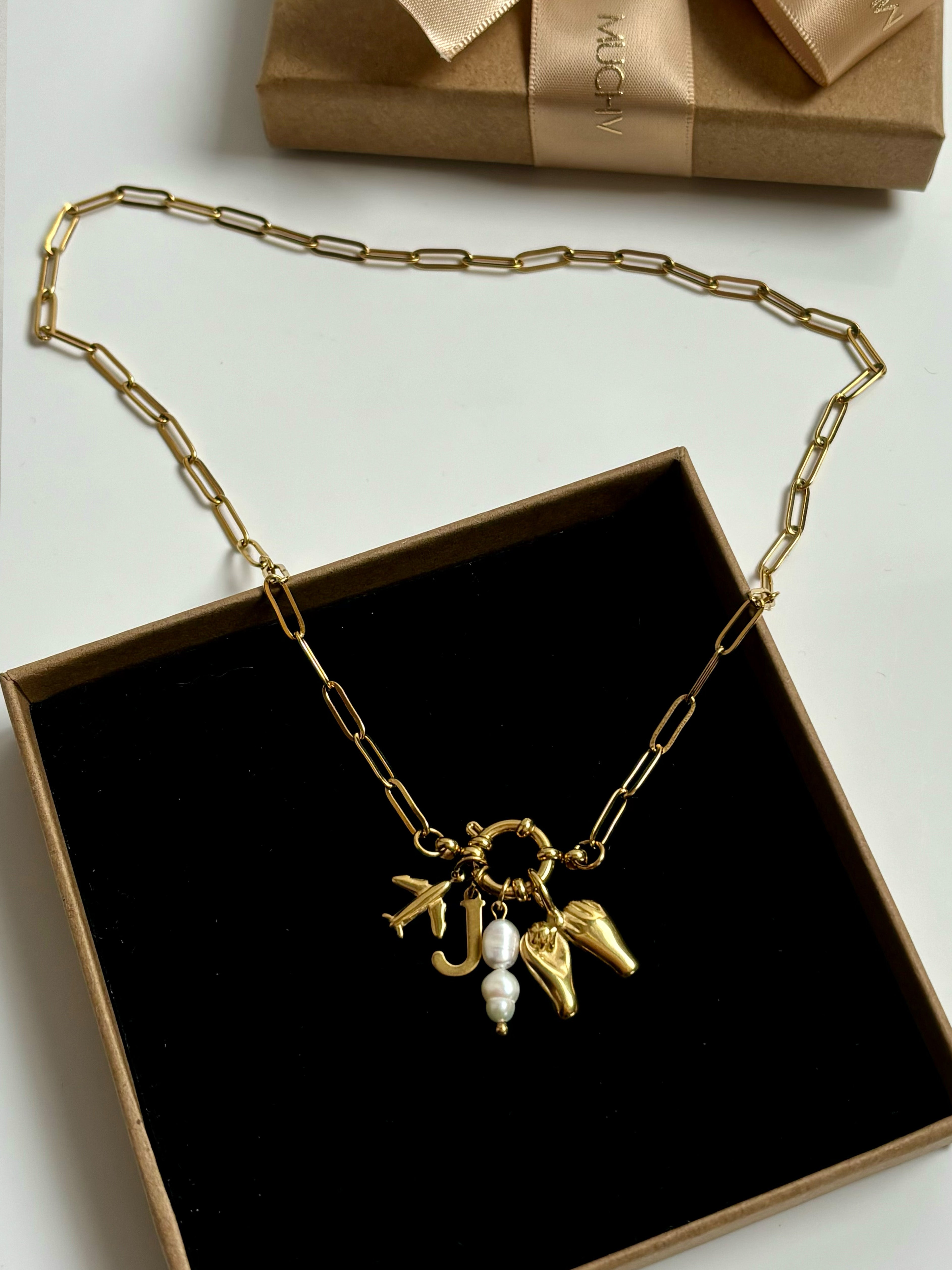 Breloque avion en or (minuscule)