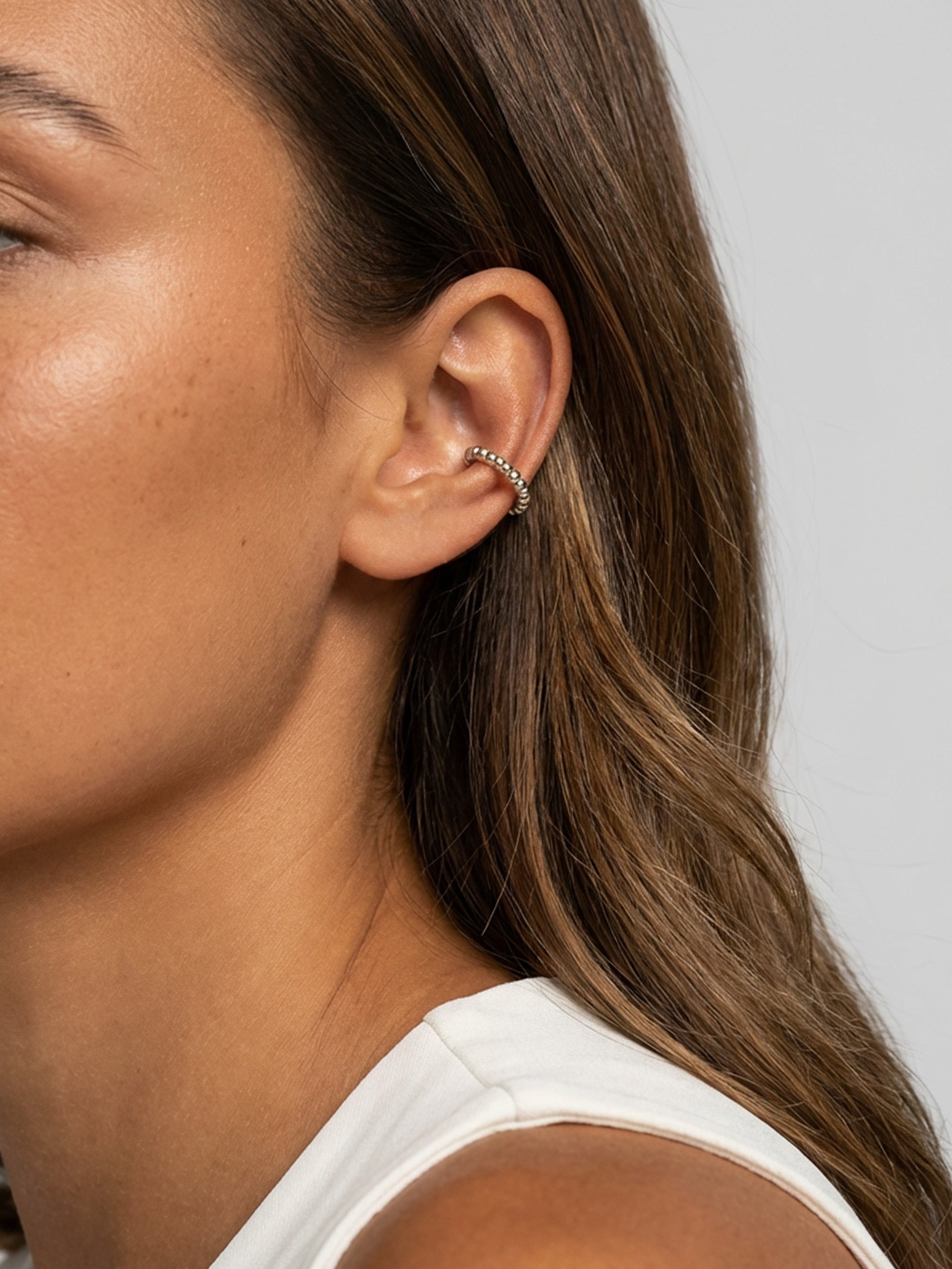 Boucles d'oreilles en forme de conque à pompon