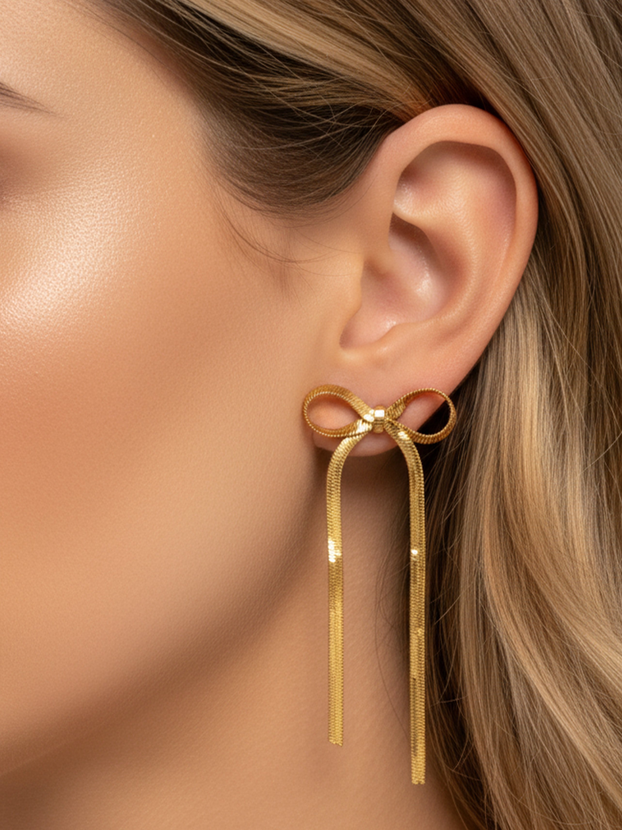 Boucles d'oreilles à tige en forme de nœud avec chaîne à chevrons