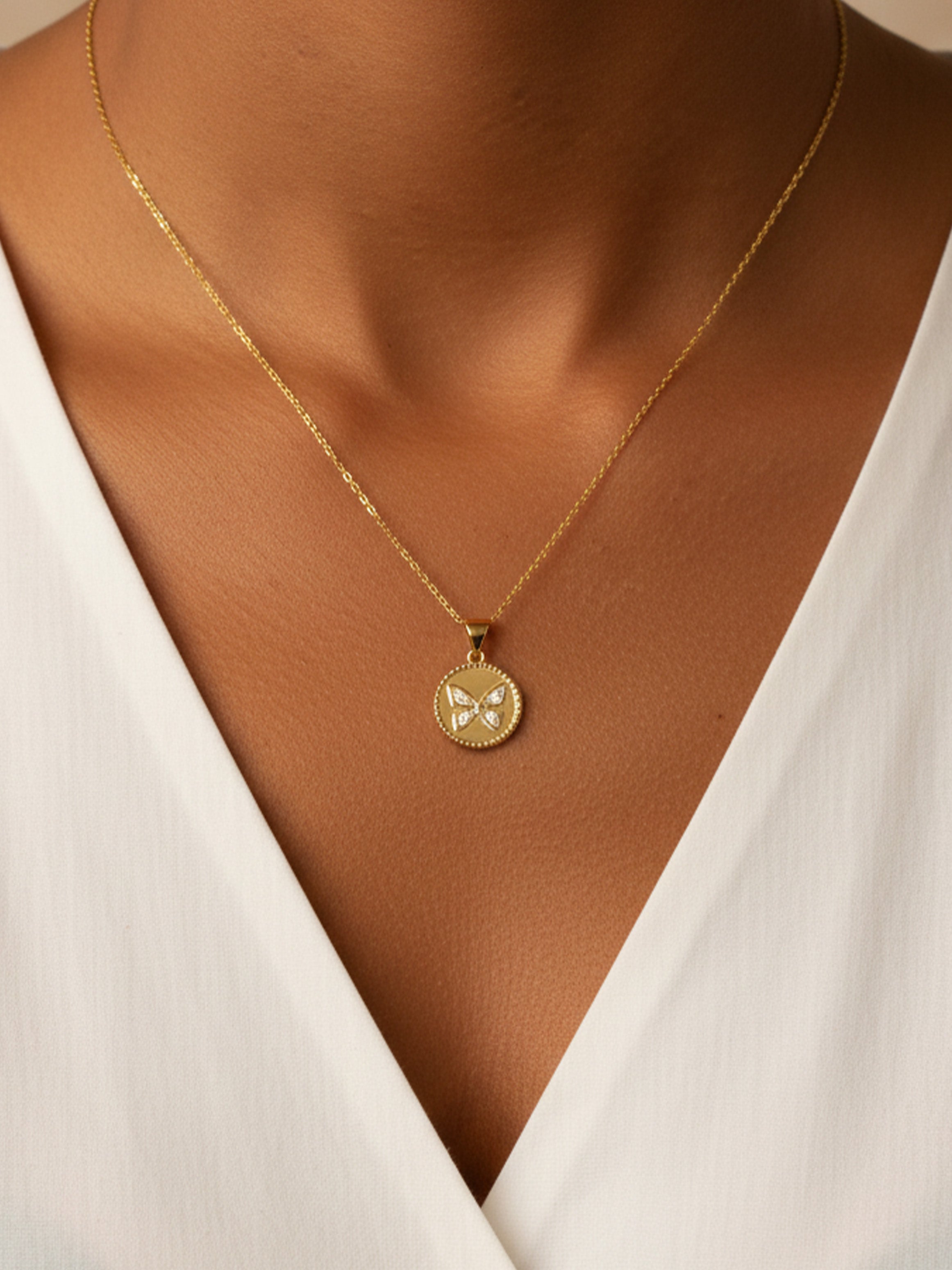 Collier de pièces de monnaie papillon