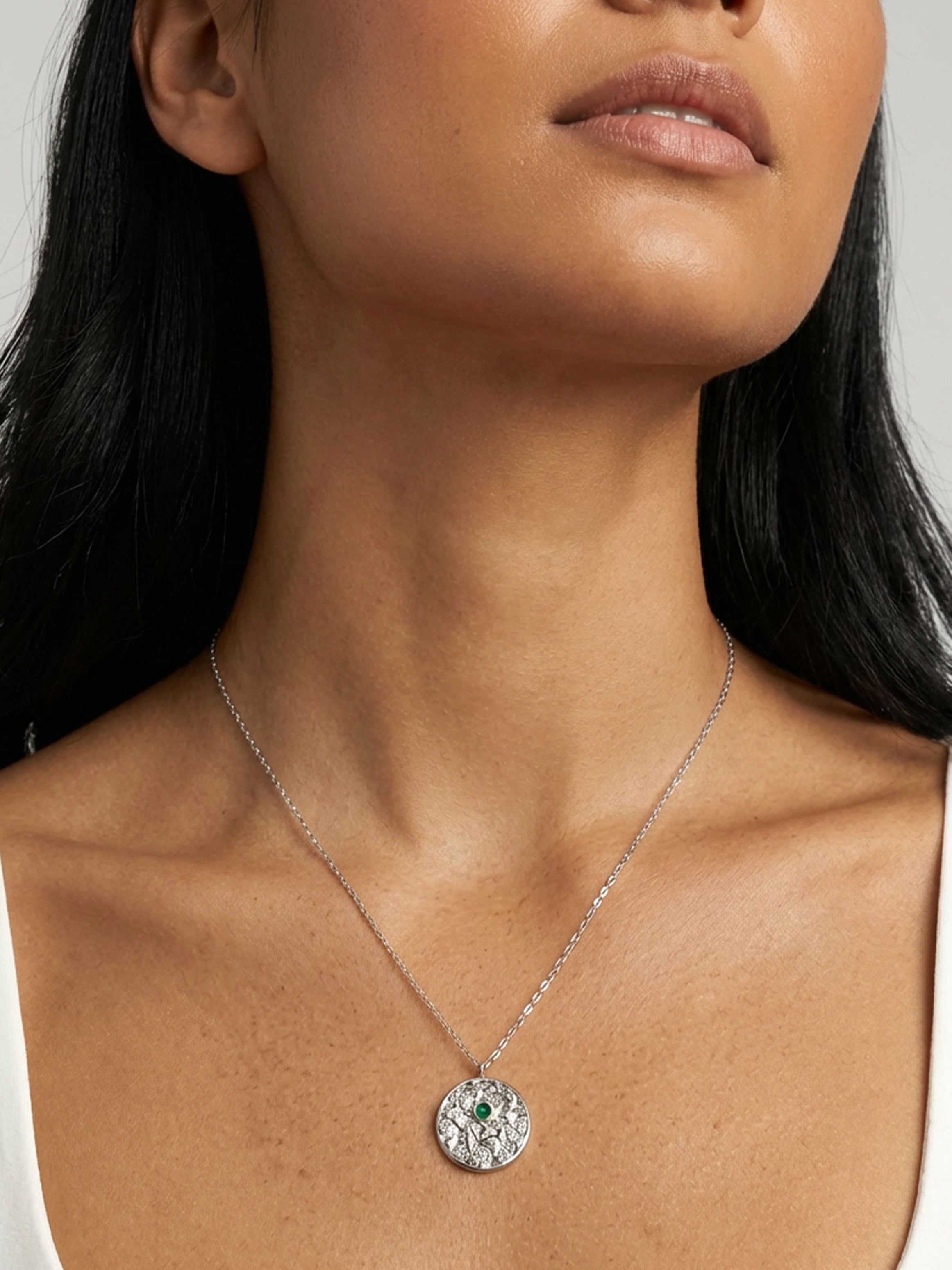 Collier de pièces de monnaie contre le mauvais œil