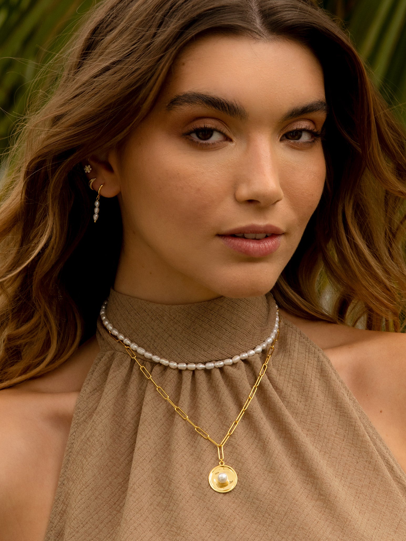 gold small huggie hoop earrings with baroque peals pearl jewellery gift for women paired with pearl choker and coin chain necklace
