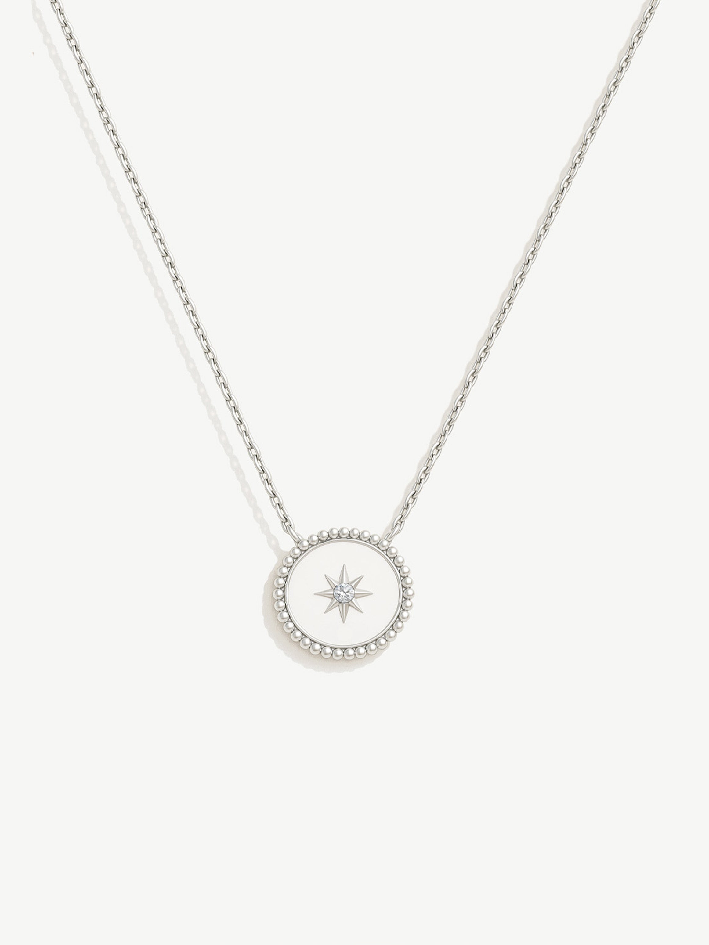 Collier avec pièce de monnaie North Star